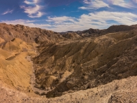 looking down into the wash before the trail