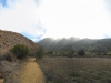 Walking along the valley floor early in the morning as the fog burns off