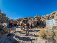 group in front of cabin