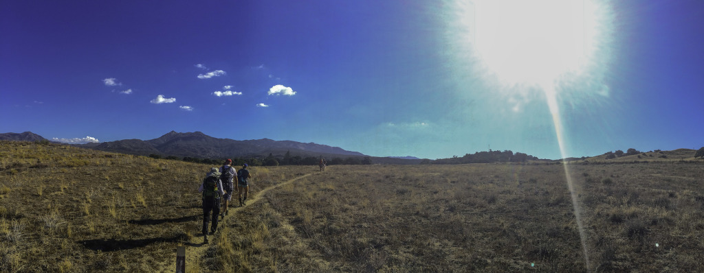 Heading along the Pacific Crest Trail through the pasture land with Hot Springs Mountain in the background. 