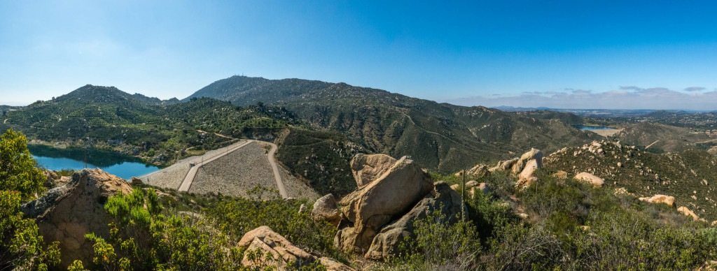 Looking down at the Ramona Dam with Mt Woodson and Lake Poway in the background. 