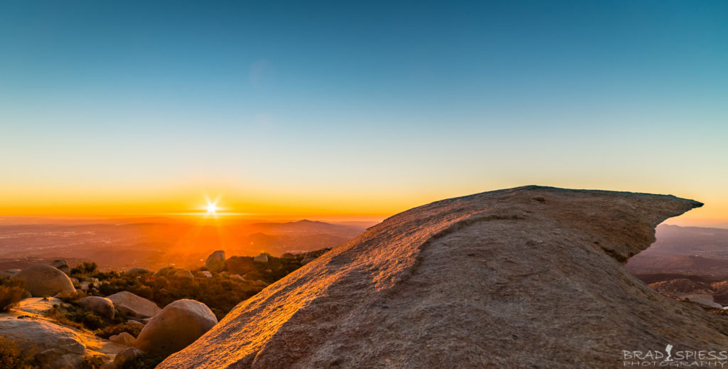 Watching the sunset from Potato Chip Rock on Mt Woodson in San Diego