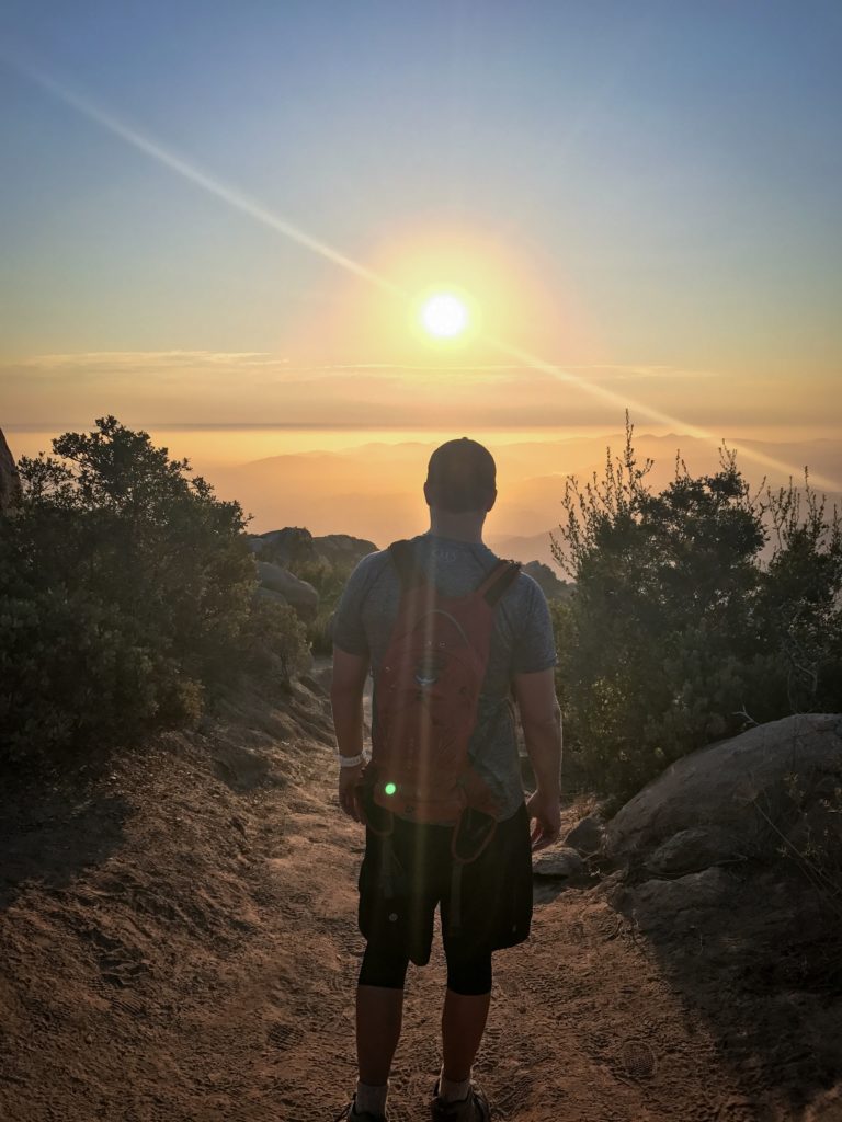 A buddy and I hiking down the Mt Woodson trail to the lake at sunset before we head back up and over to the back at night