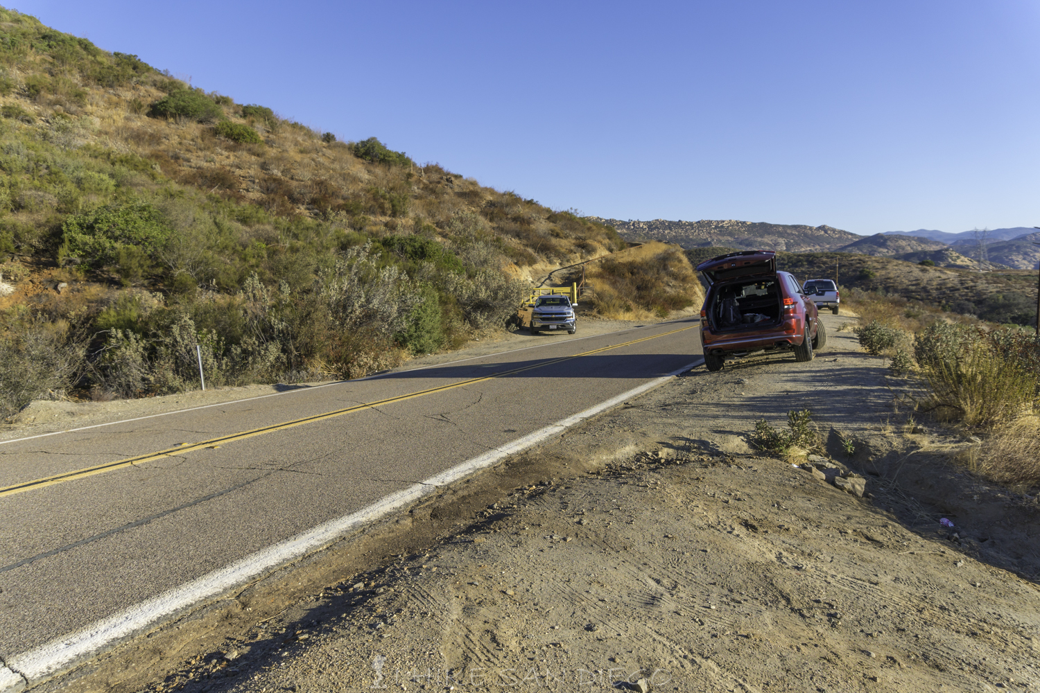 The two small pullouts for parking near the Lawson Peak Trailhead