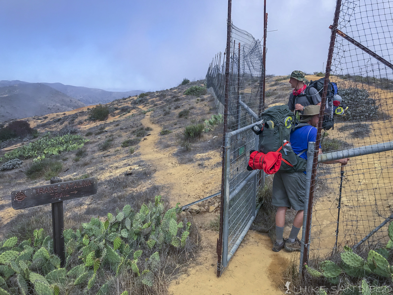 The gate you need to pass through to continue on the trail by Haypress Reservoir. 