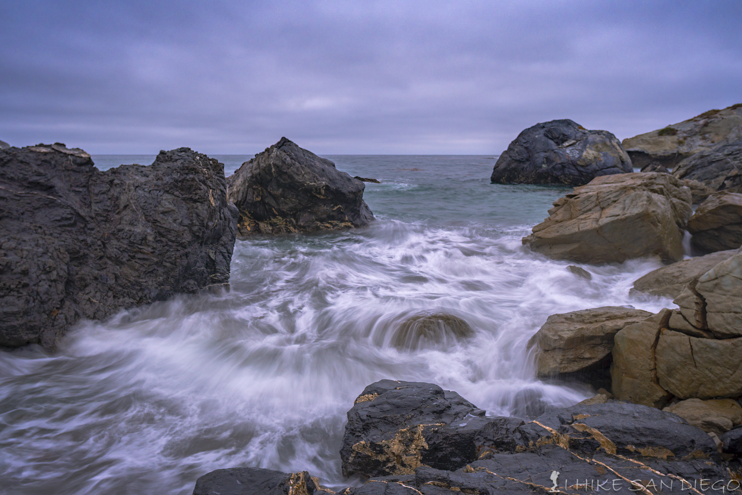 Waves crashing on the rocks in Shark Harbor